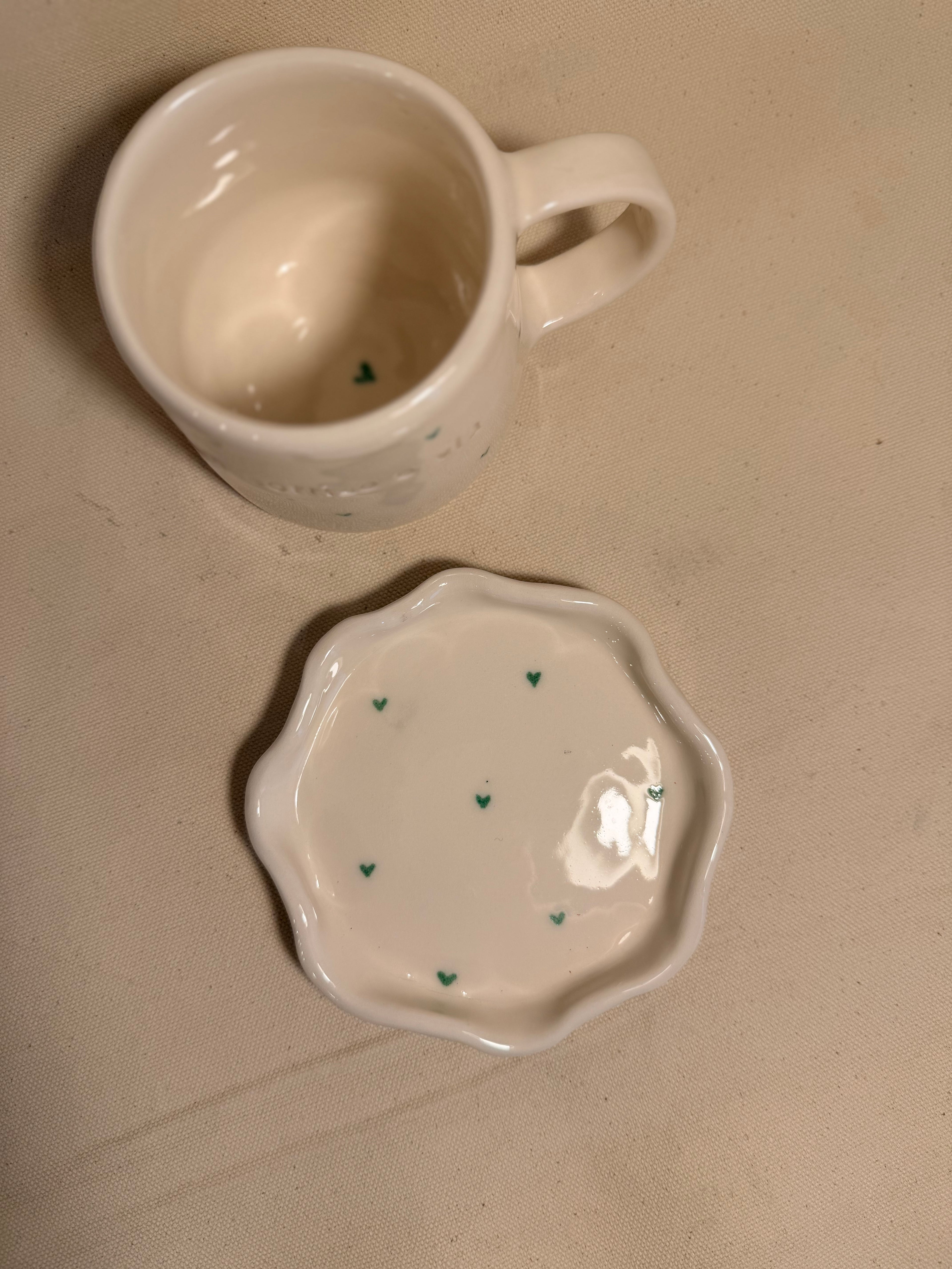 Tazza con piattino "Un sorriso e via"