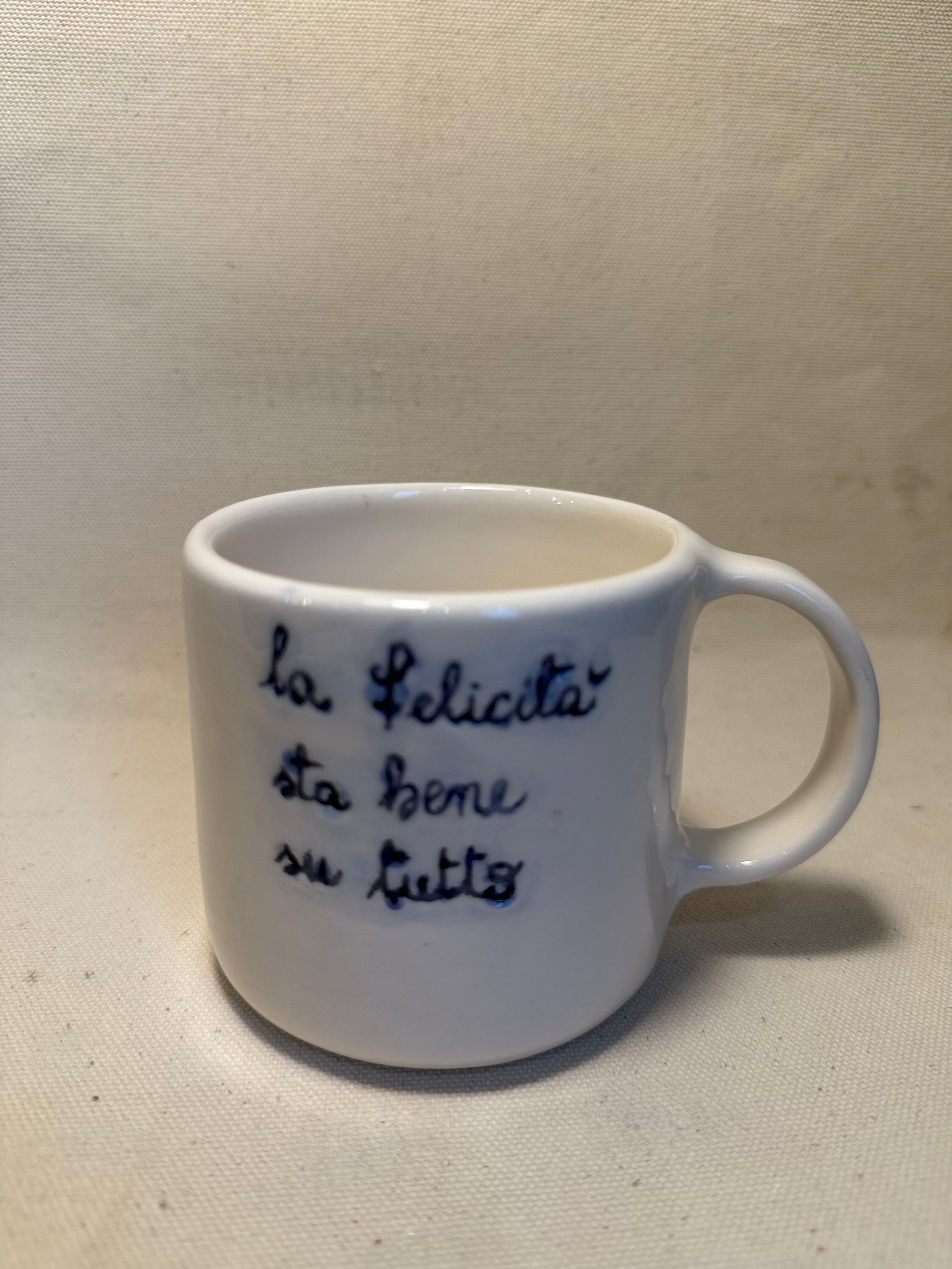 Tazza "La felicità sta bene su tutto"