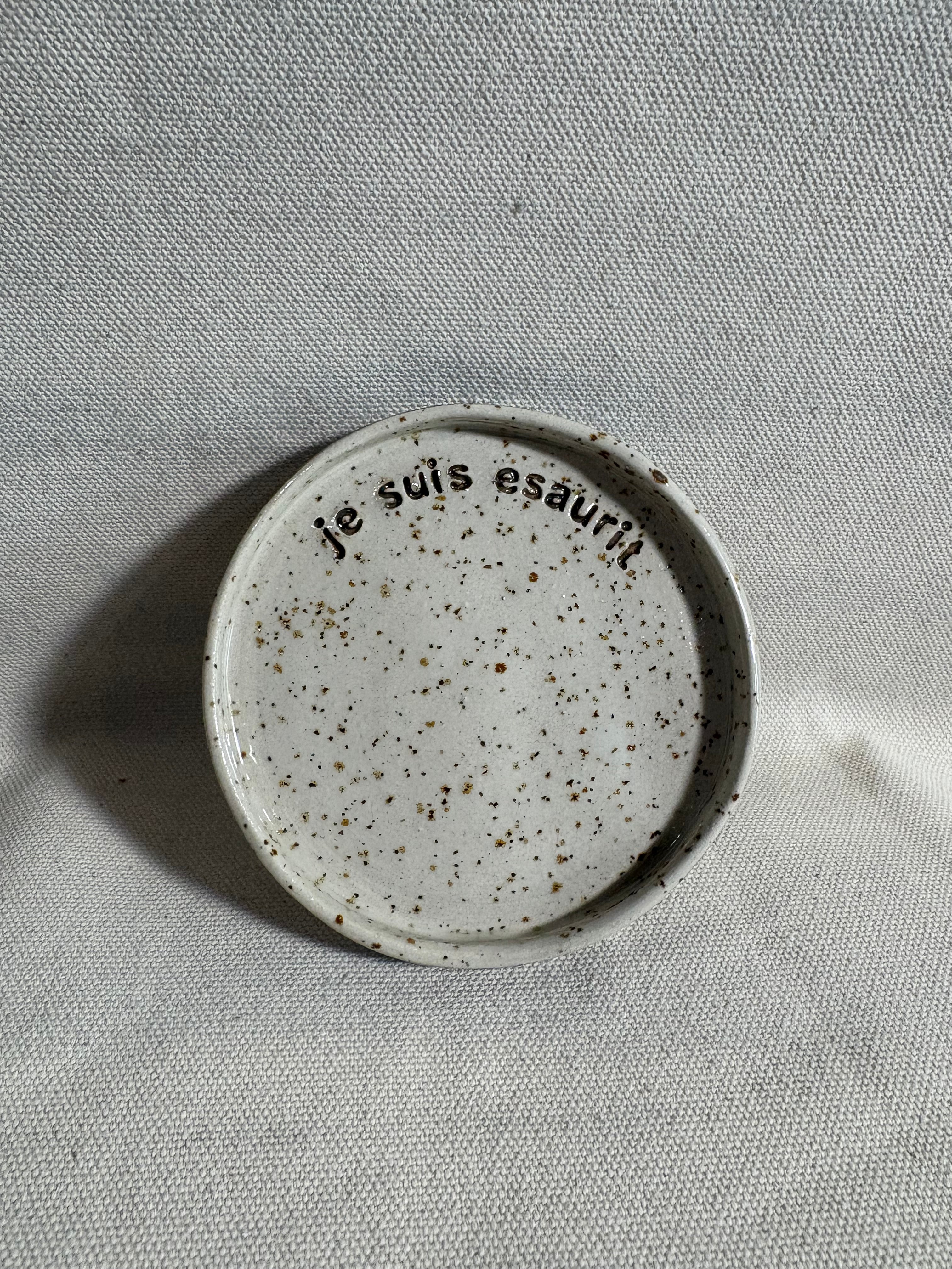Piattino "Je Suisse Esaurit"